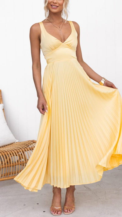 https://www.maven-london.com/products/pleated-vneck-midi-dress-women-1.jpg
